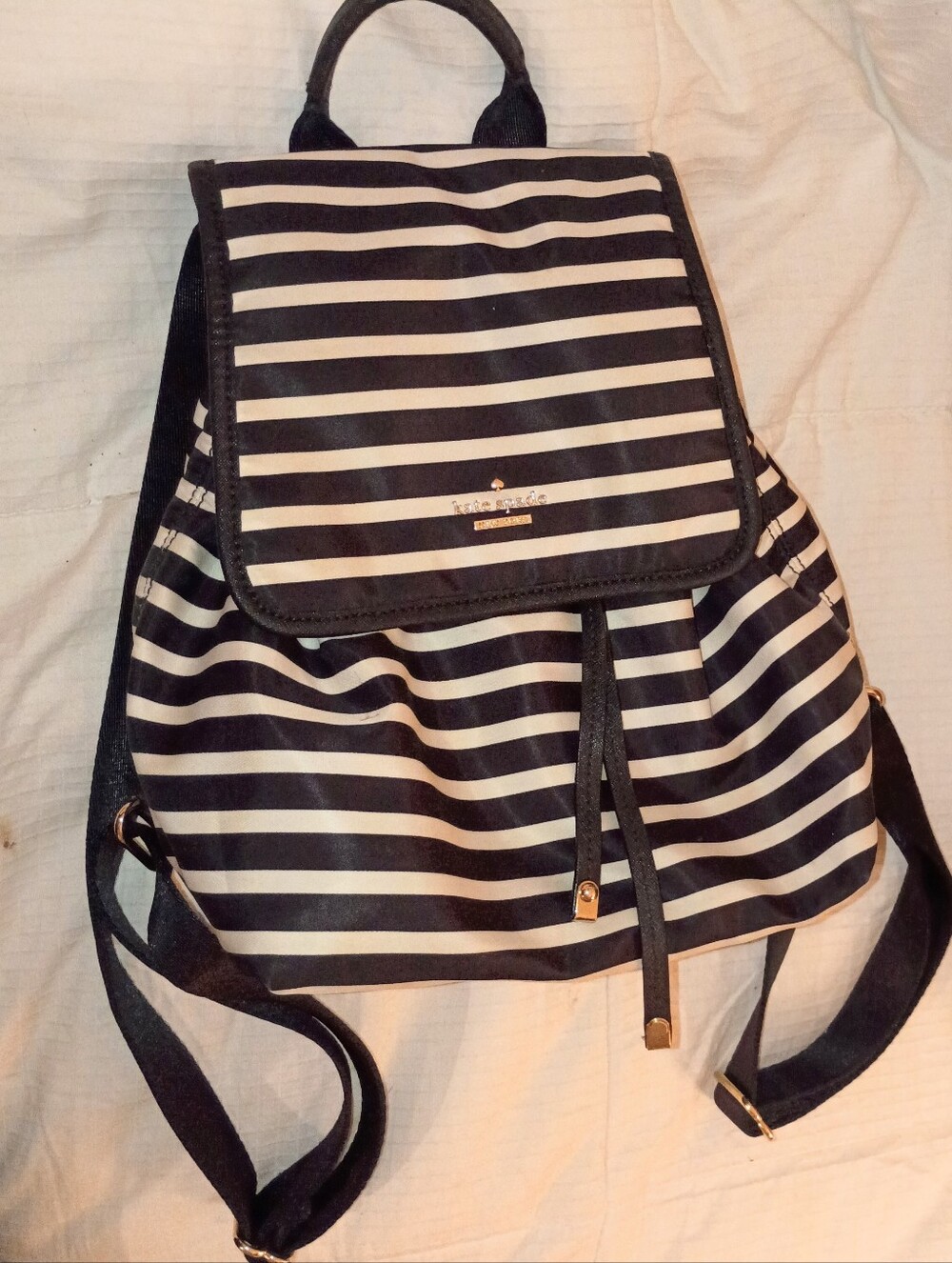 kate spade Black and White Striped Drawstring Backpack